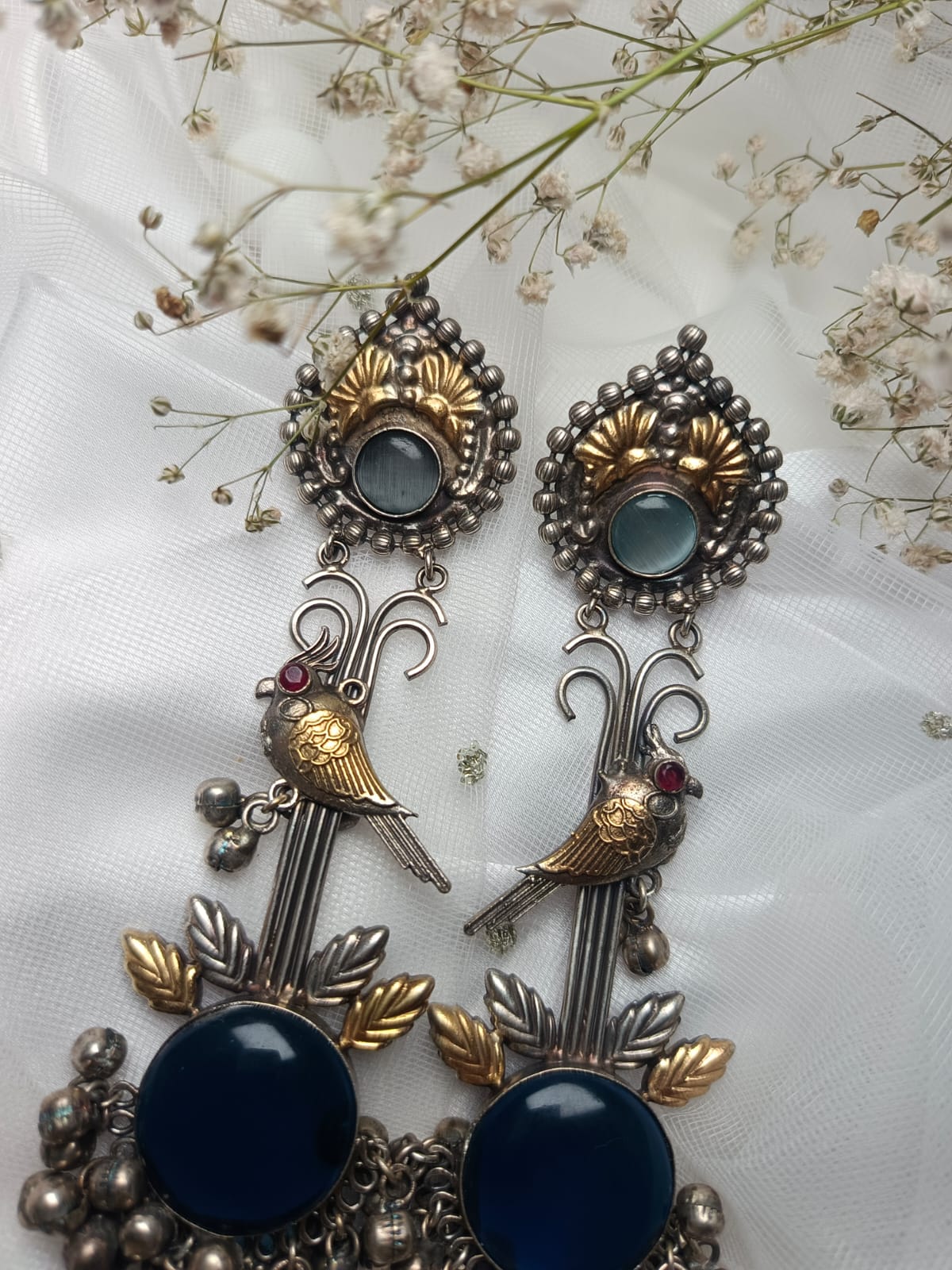 Gold Bird Motif brass Earrings with Blue Stone Drop