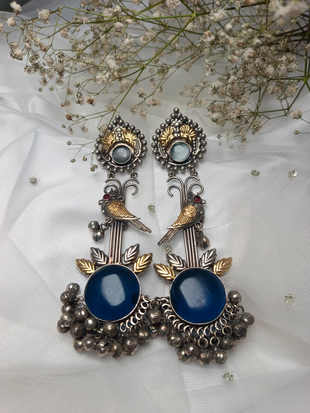 Gold Bird Motif brass Earrings with Blue Stone Drop