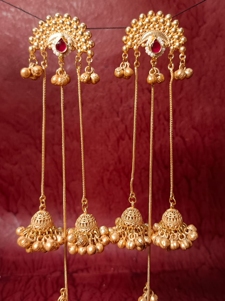 Layered Brass Jhumkas with Red Stone Accents & Ghungroos