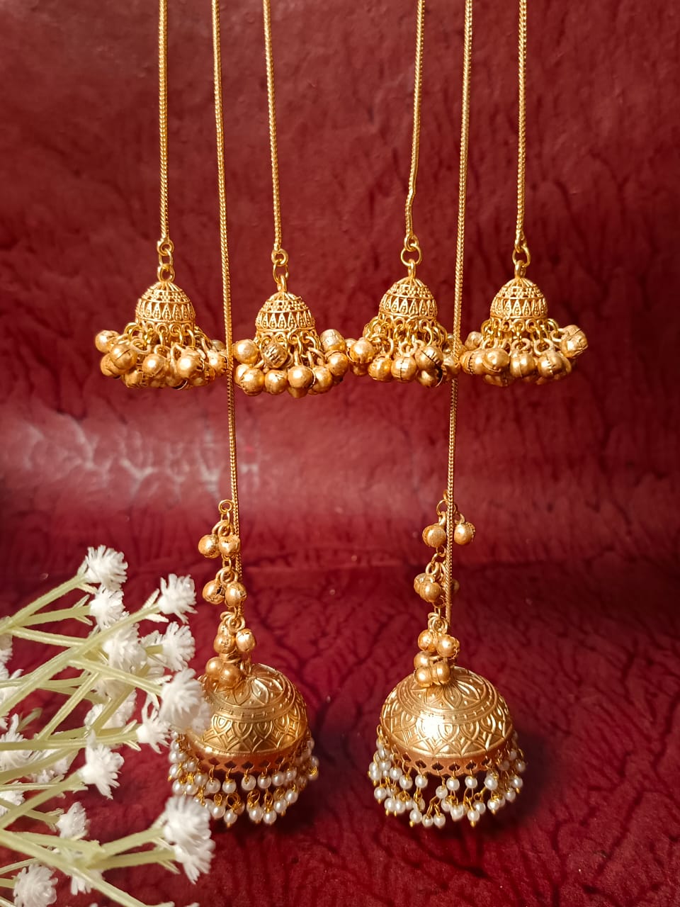 Layered Brass Jhumkas with Red Stone Accents & Ghungroos