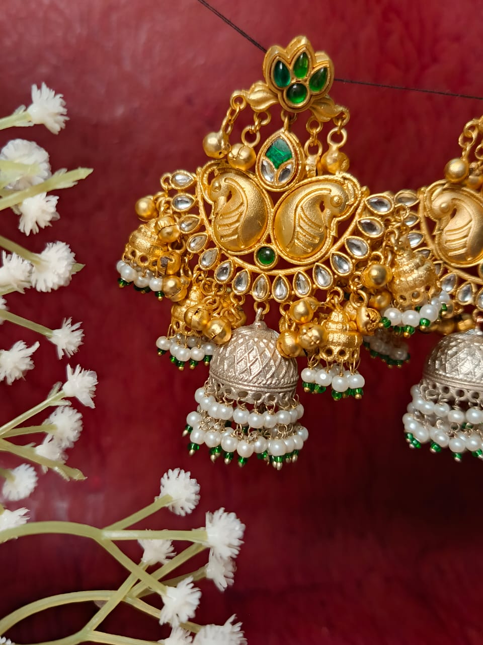 Luxurious Paachi Kundan Brass Jhumka Earrings - Emerald & Pearl