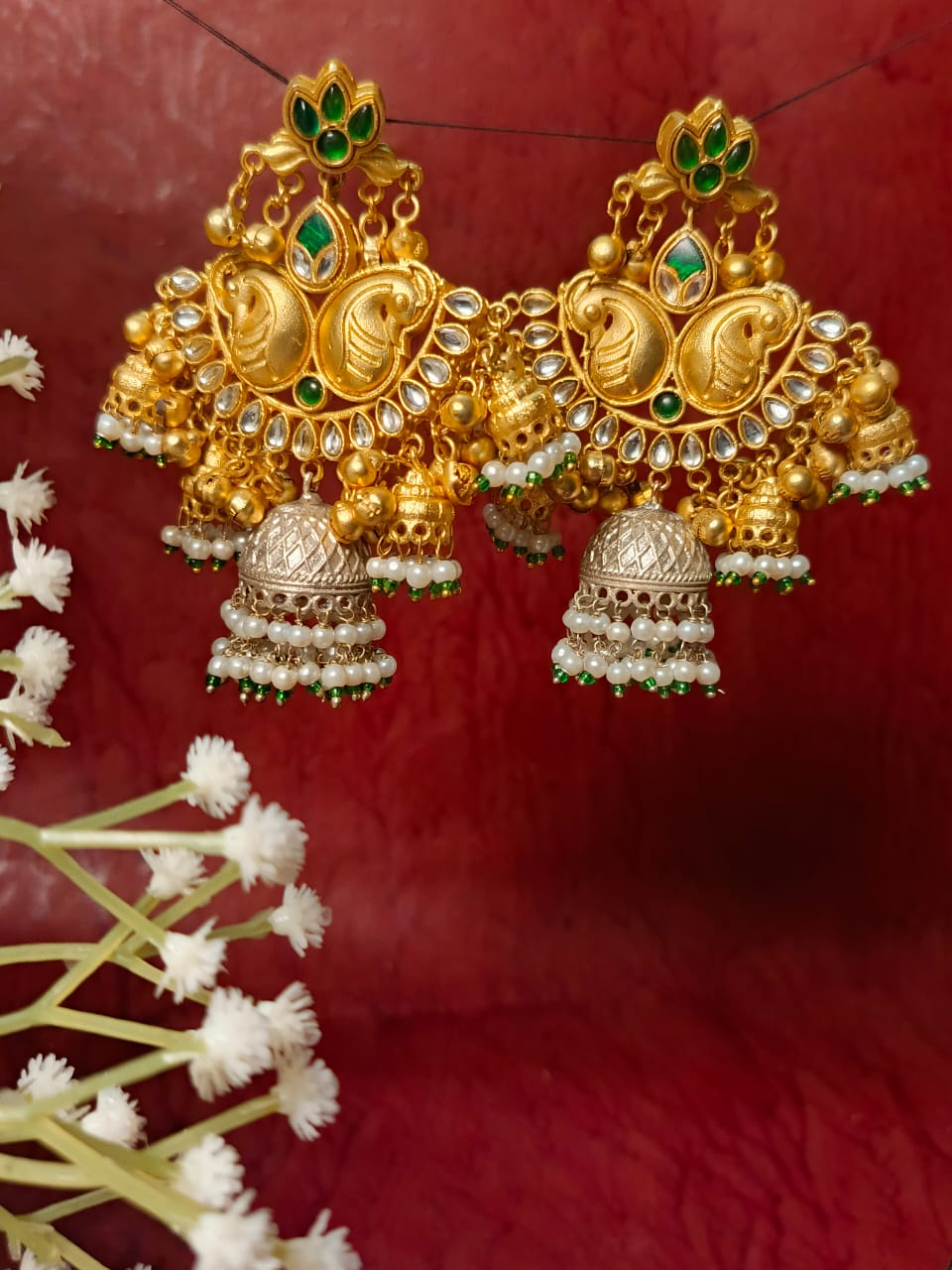 Luxurious Paachi Kundan Brass Jhumka Earrings - Emerald & Pearl