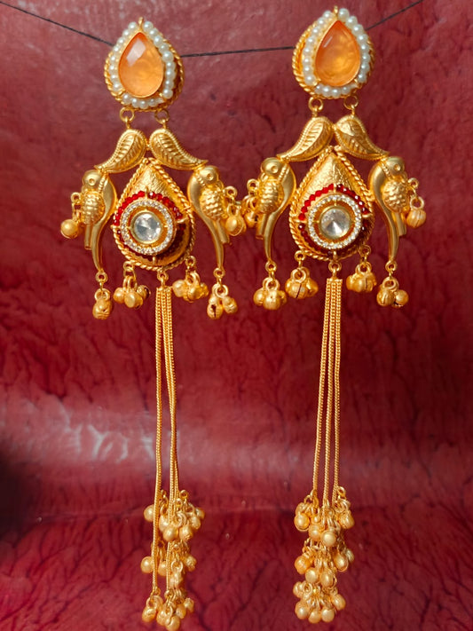 Intricate Bird Motif Brass Earrings with Dangling Chains