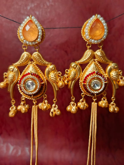 Intricate Bird Motif Brass Earrings with Dangling Chains